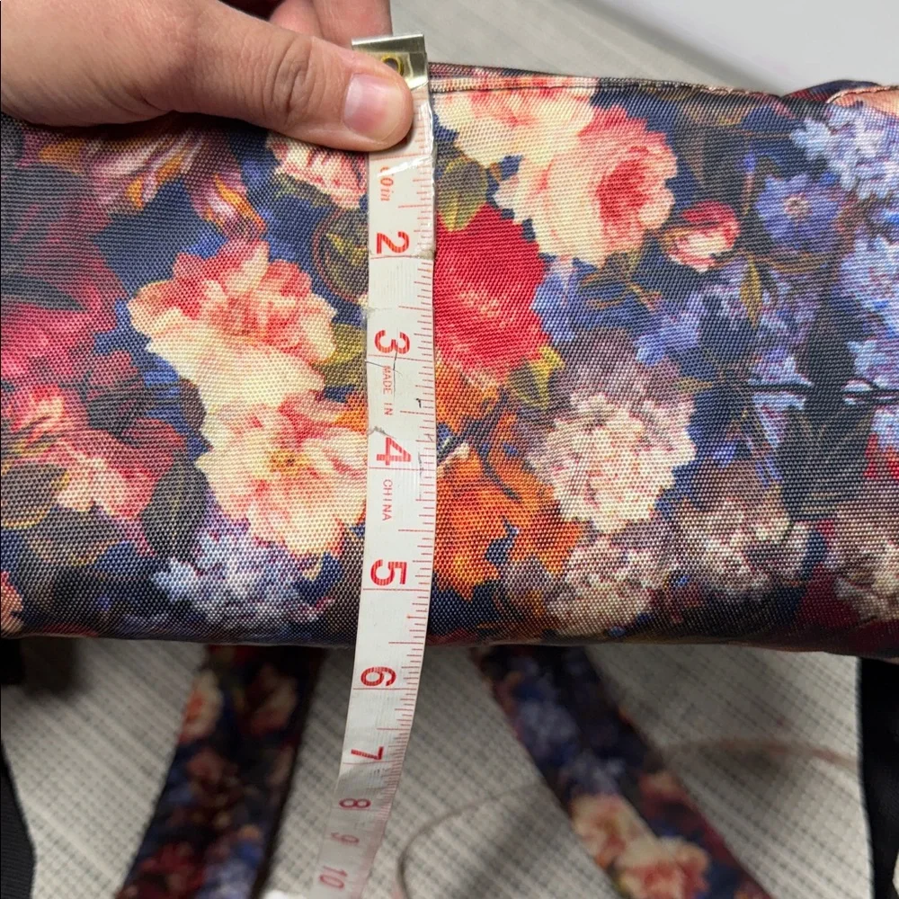 KROSER laptop backpack featuring a dark floral pattern